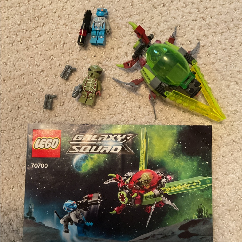 Lego galaxy squad space swarmer set with instructions.